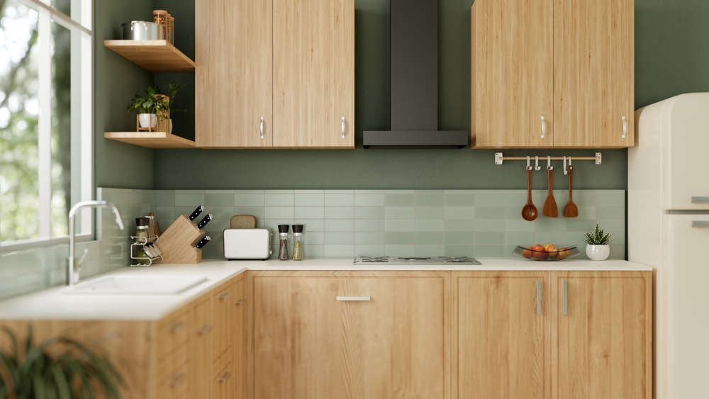 Moderní dřevěná kuchyně s mentolově zelenou dlažbou.